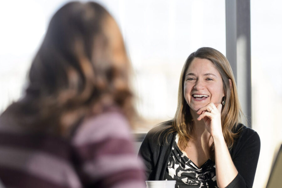 Two people engaged in conversation